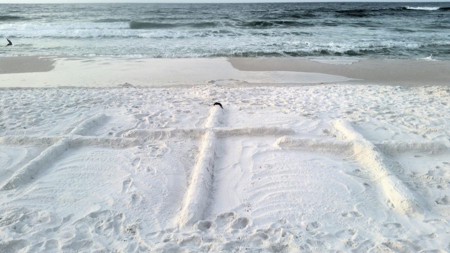 La mort chrétienne et le Paradis, Cette image montre trois croix sur du sable blanc